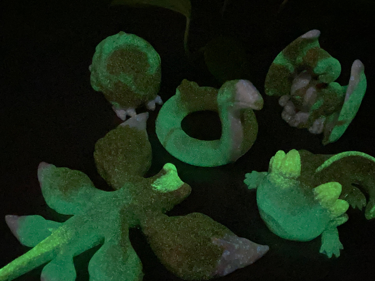 a close up of a group of fake plants