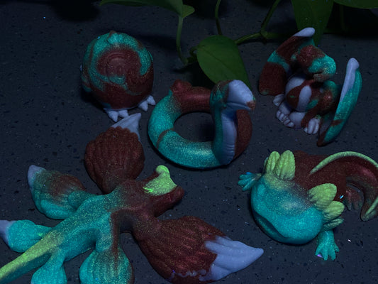 a group of toy figurines sitting on top of a table