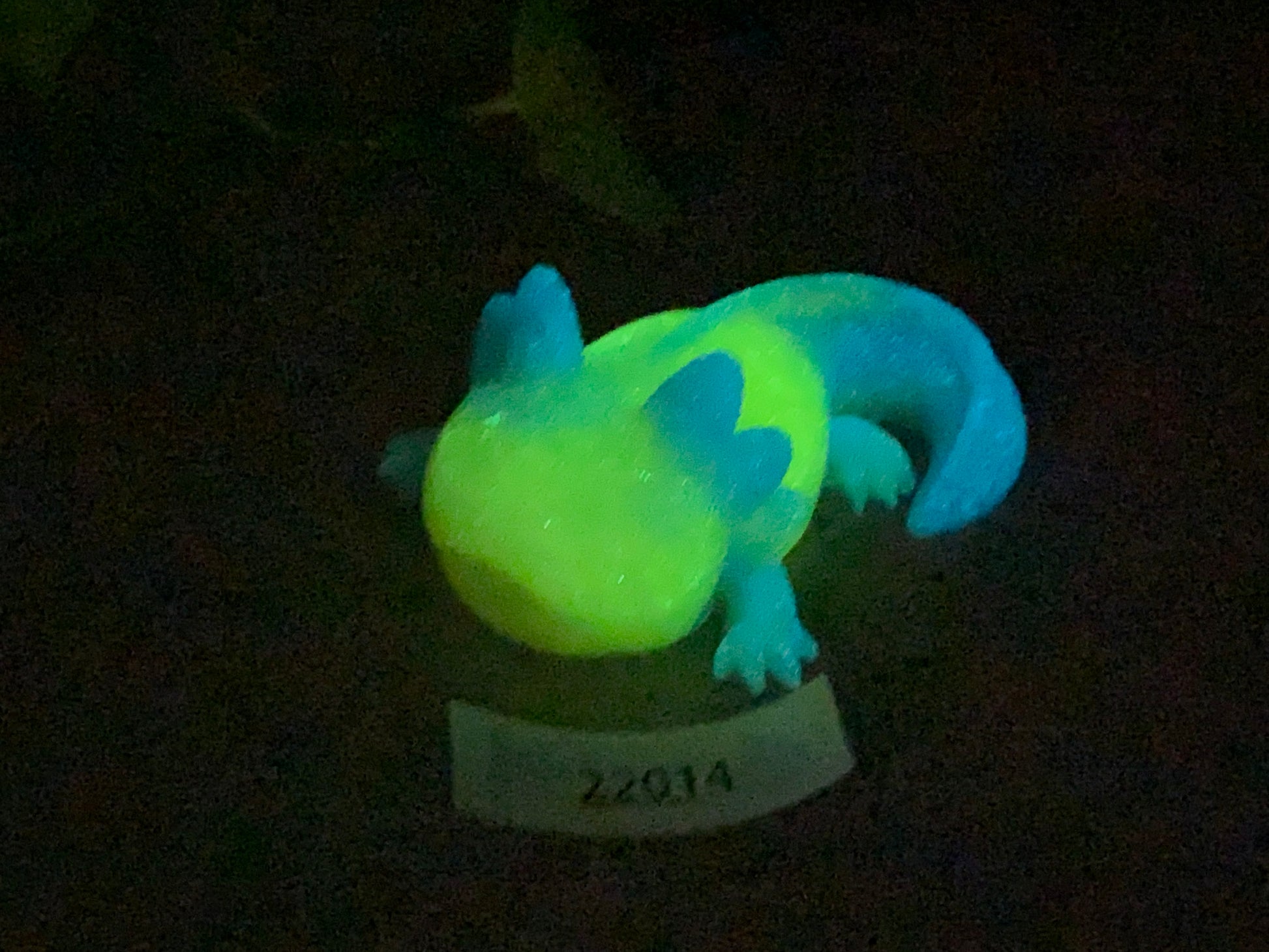 a glowing toy of a lizard on a table