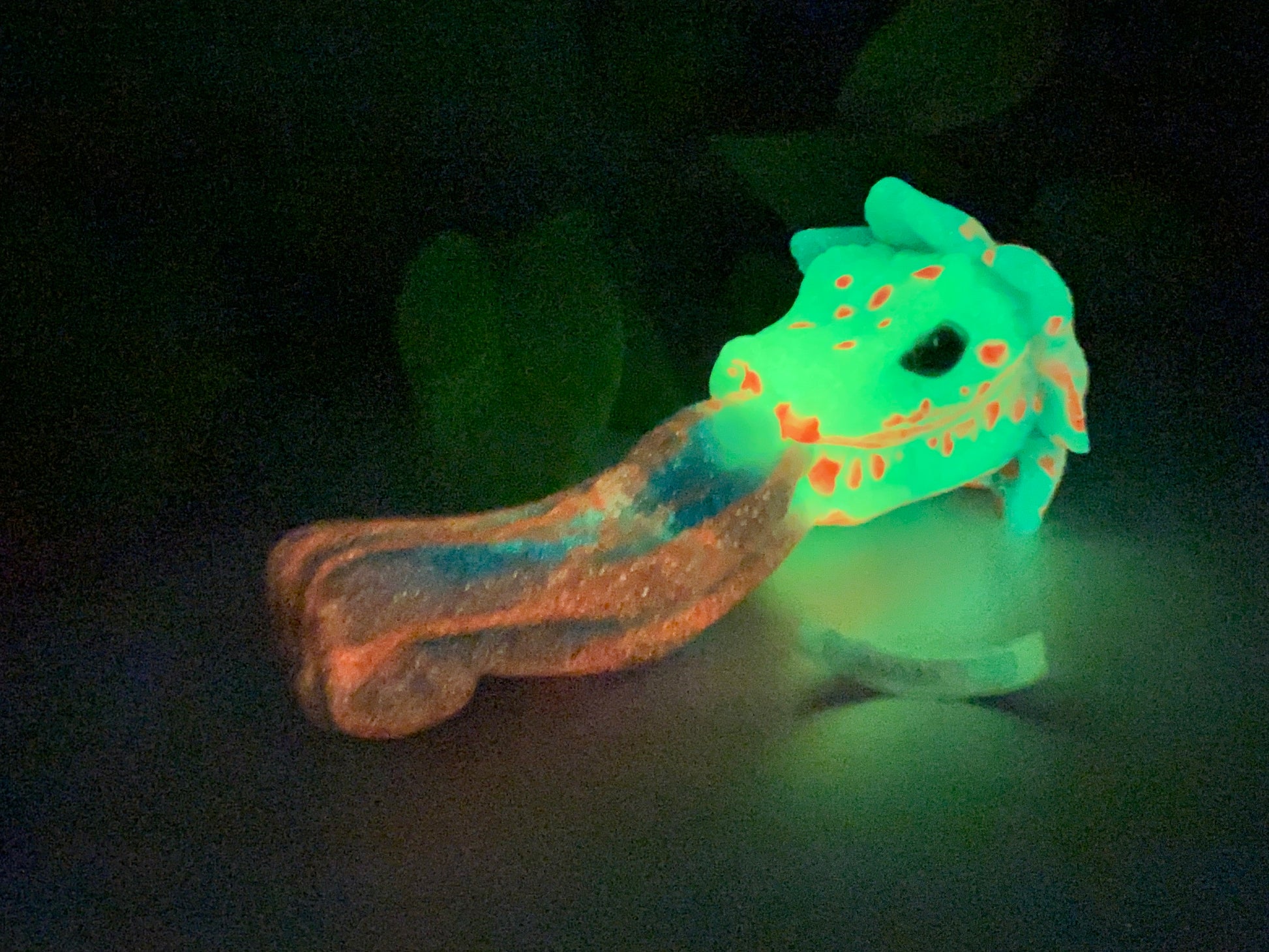 a glow in the dark toy of a giraffe