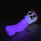 a glow in the dark toy with a ghost face on it