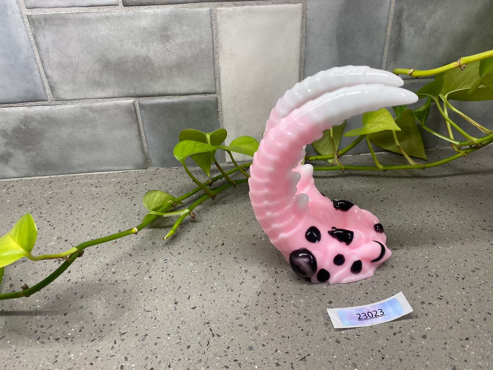 a pink and black object sitting on top of a counter