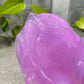 a purple object sitting on top of a table