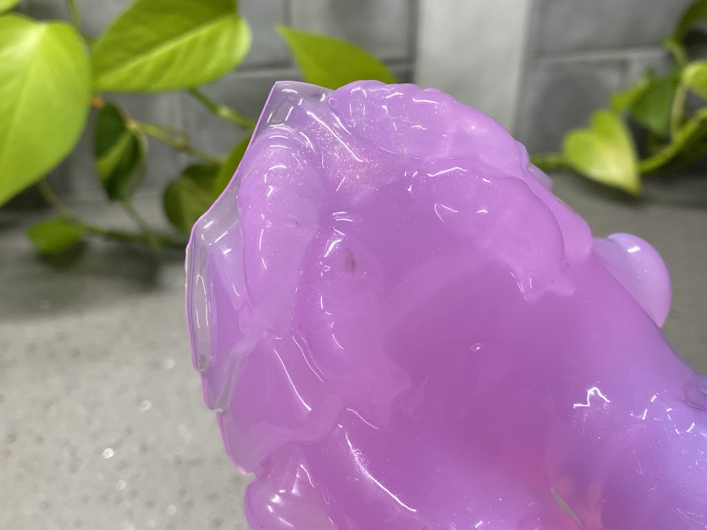 a purple object sitting on top of a table