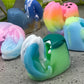 a group of soaps sitting on top of a cement ground