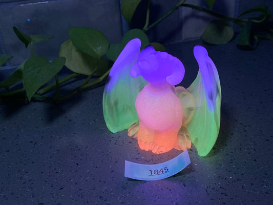 a glowing toy with wings on top of a table