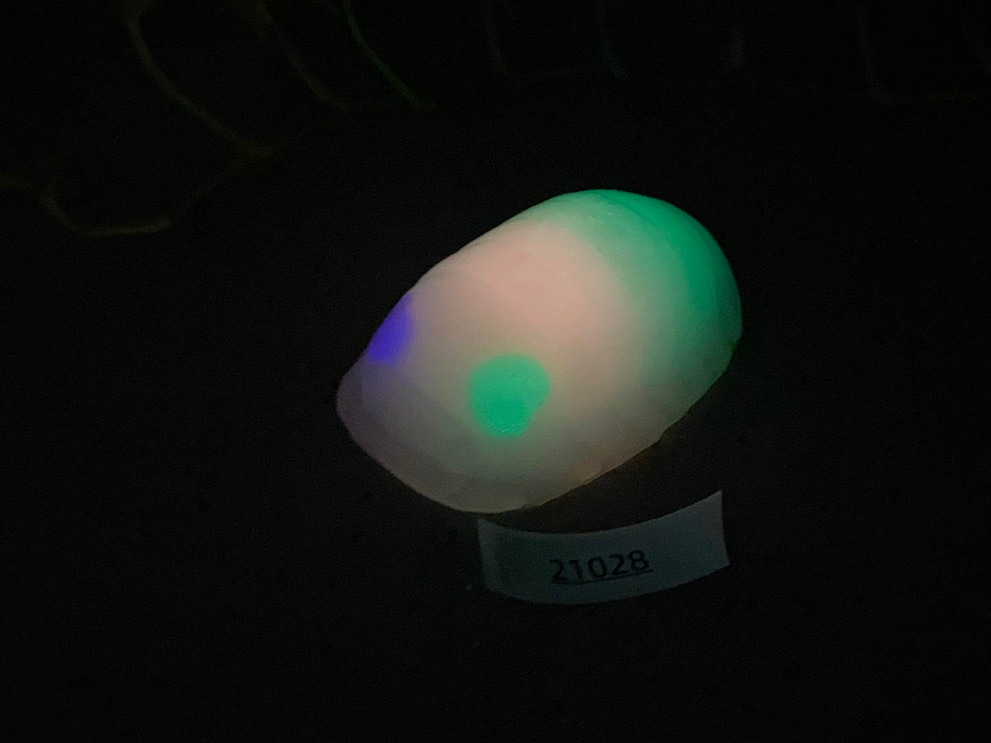 a white and green object sitting on top of a table