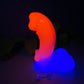 a neon colored object sitting on top of a table