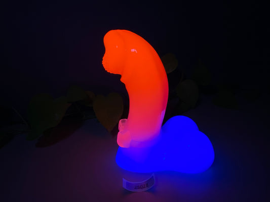 a neon colored object sitting on top of a table