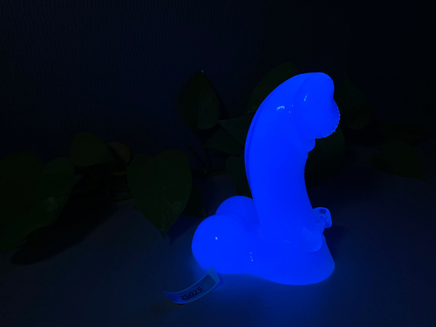 a blue light sitting on top of a table