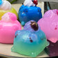 a group of soaps sitting on top of a plate