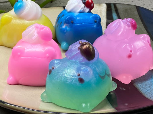 a group of soaps sitting on top of a plate