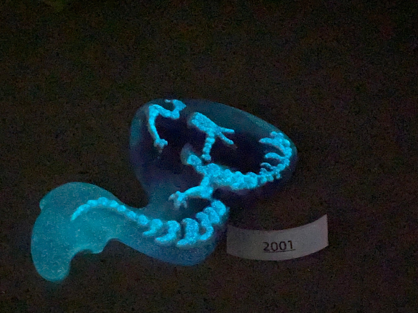 a glow in the dark picture of a toothbrush