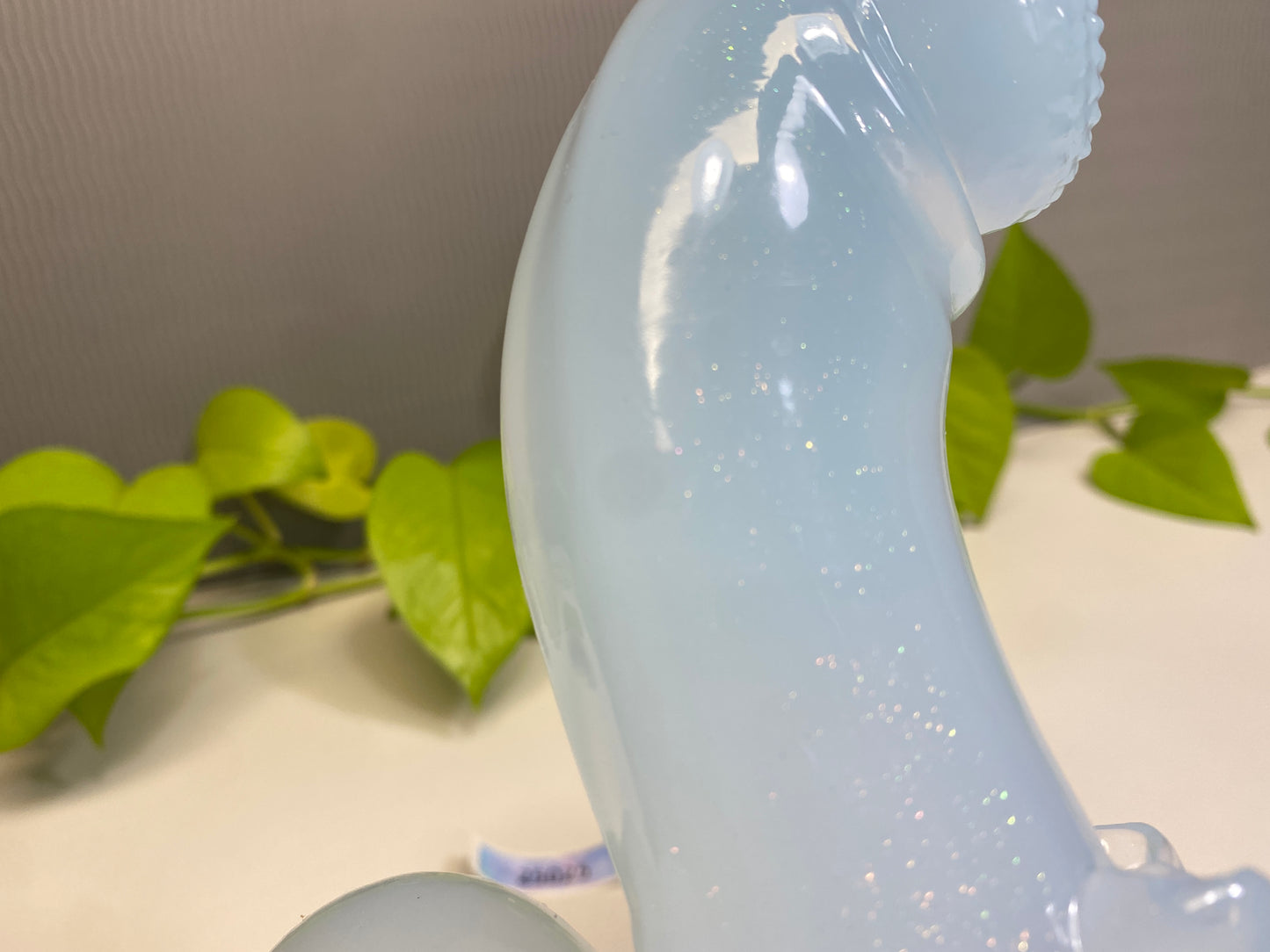 a white plastic object sitting on top of a table