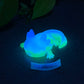 a glow in the dark toy of a small animal