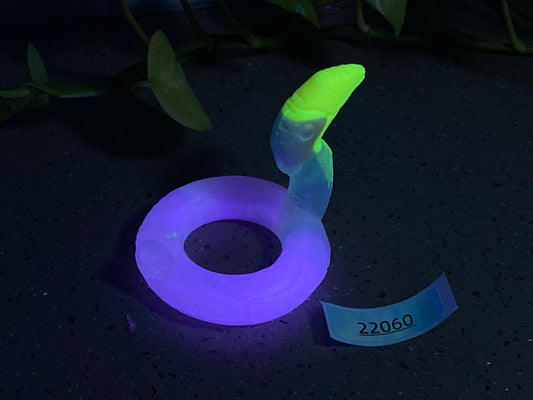 a glow ring sitting on top of a black surface