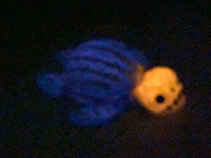 a blurry photo of a blue and yellow object