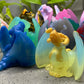 a group of plastic figurines of different colors