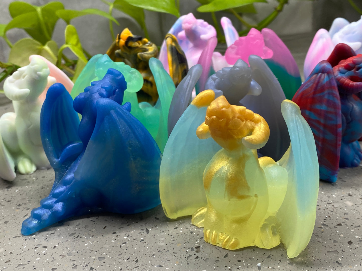 a group of plastic figurines of different colors