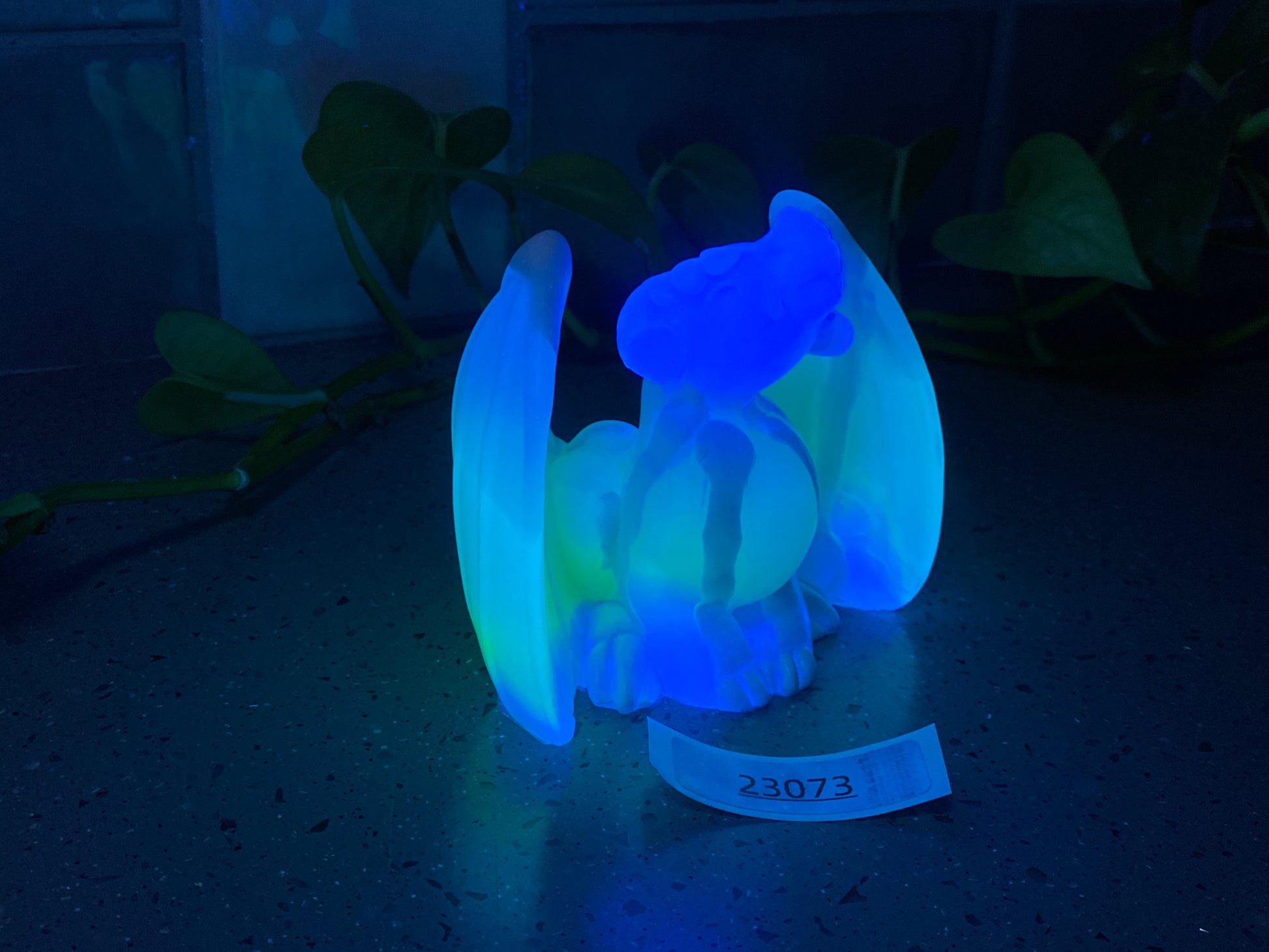 a blue and white object sitting on top of a table