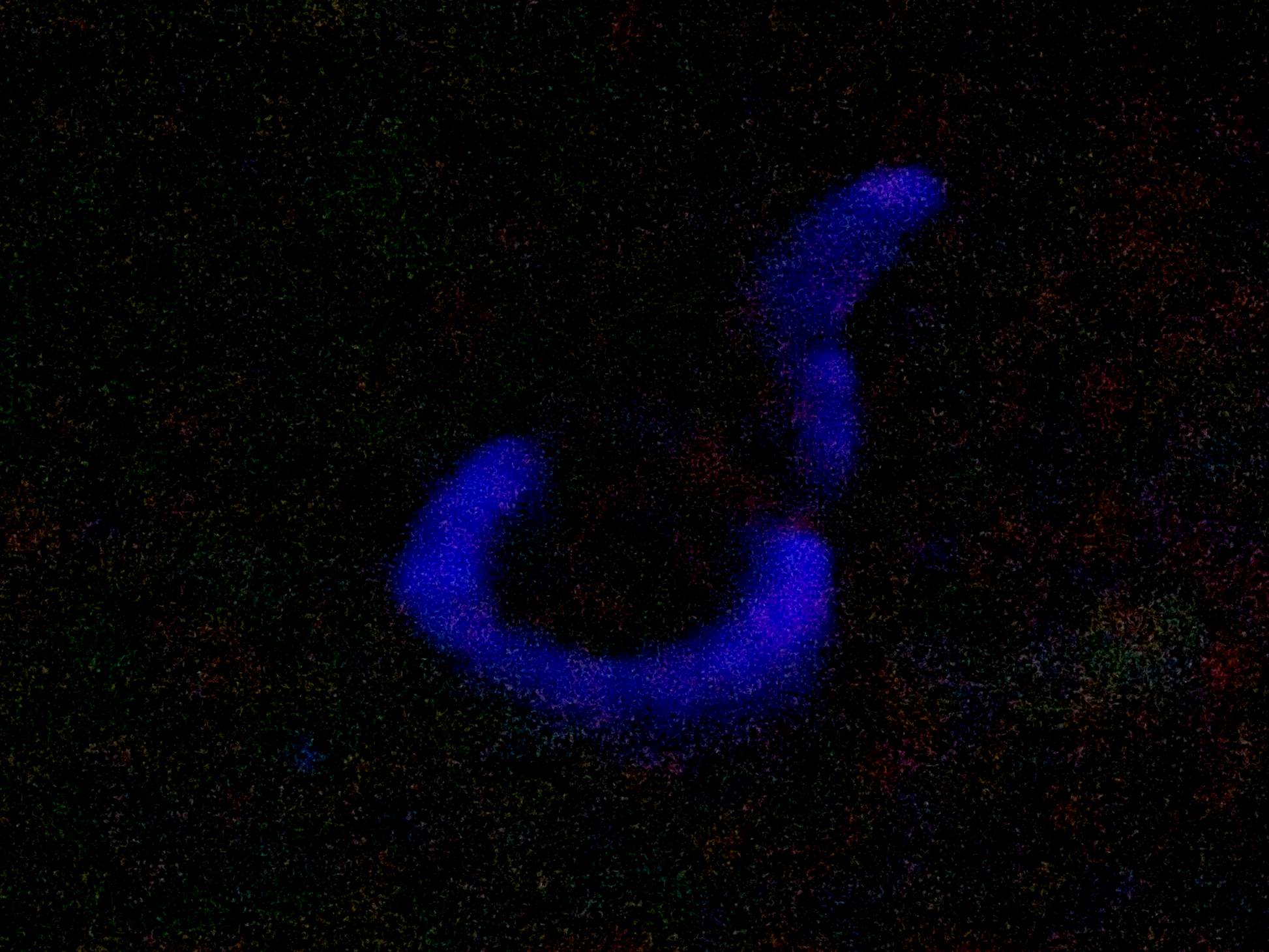 a blue object is glowing in the dark