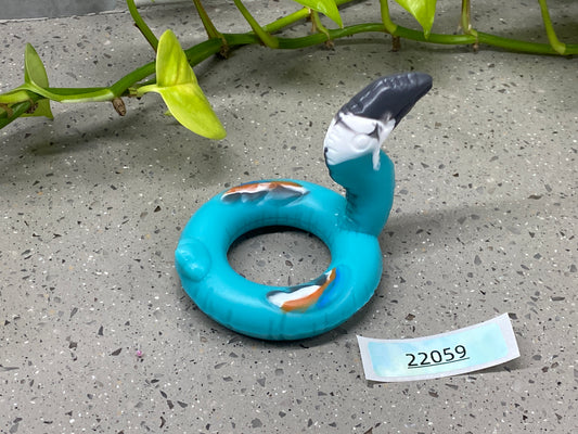 a blue ring with a bird sitting on top of it