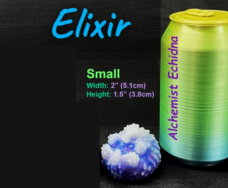 a can of eliir energy drink next to a rock