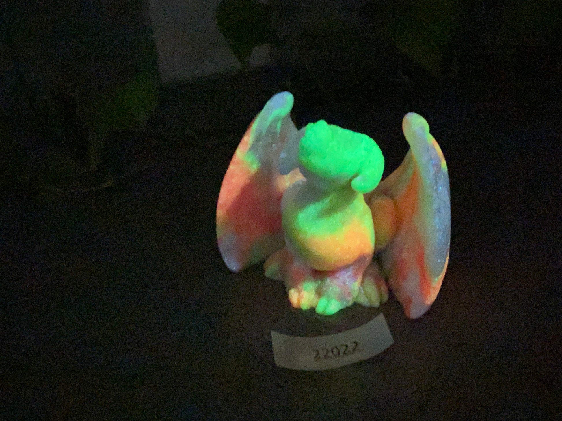 a glow stuffed animal sitting on top of a table